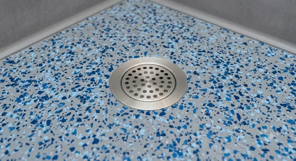 dark blue and light blue epoxy flooring with round drain (AI-generated for illustrative purposes)